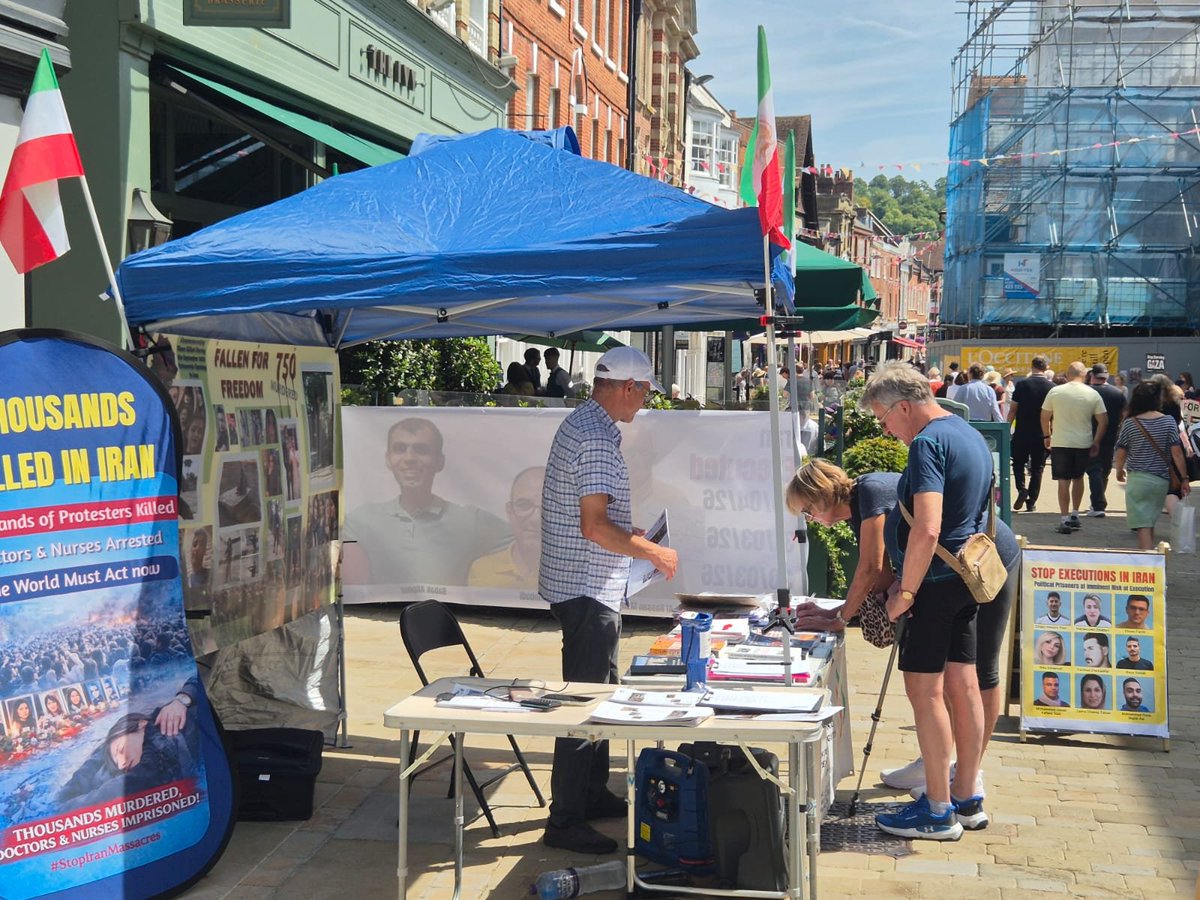 iranianacademic's tweet photo. On 25 July 2026, supporters of the National Council of Resistance of Iran (NCRI) held a book table and photo exhibition in Winchester, UK, exposing the Iranian regime's escalating executions and systematic human rights violations. The event, which received an exceptional public response, expressed solidarity with the Iranian people's struggle for freedom, democracy, and a secular republic. Visitors also signed petitions urging the UN and the international community to take concrete action in support of the Iranian people's fight for justice and democratic change.

#StopExecutionsInIran #NCRIAlternative #No2ShahNo2Mullahs