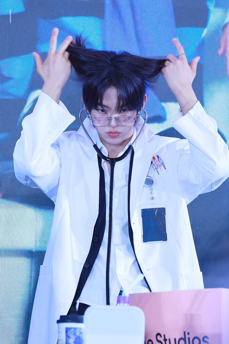 dohshund's tweet photo. his puppy ears popped out of his hair nooooooooo the whole world is going to find out that he’s the first puppy to debut as an idol https://t.co/HsSL2QeQu1