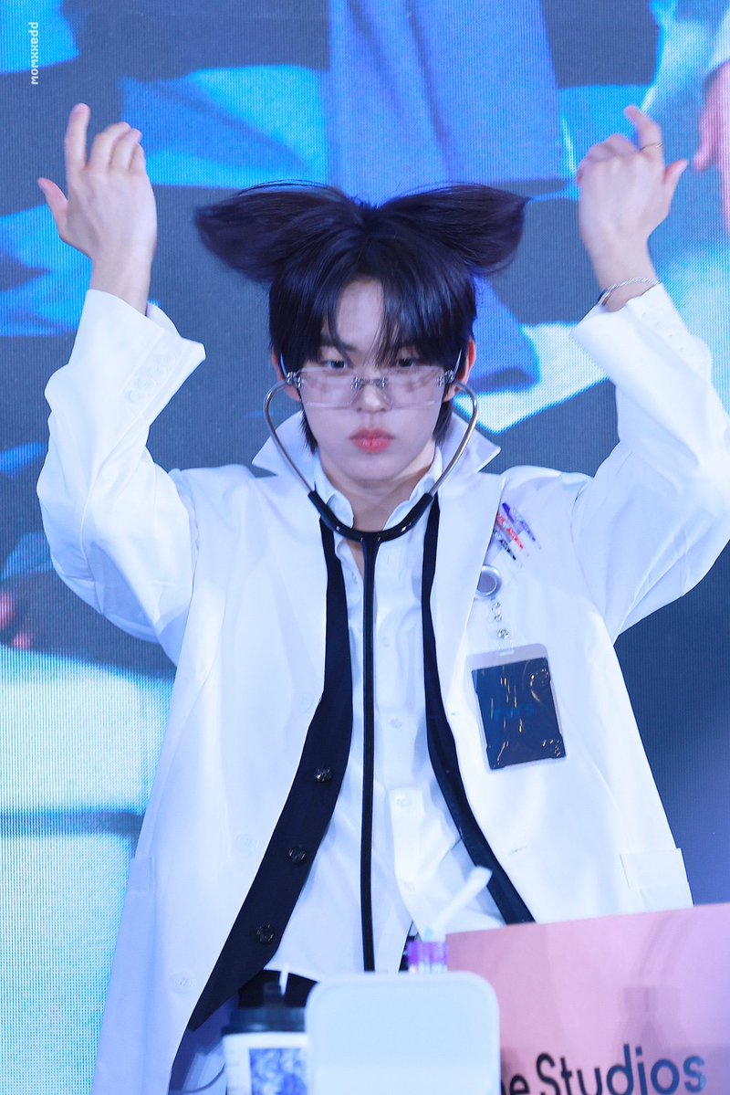 dohshund's tweet photo. his puppy ears popped out of his hair nooooooooo the whole world is going to find out that he’s the first puppy to debut as an idol https://t.co/HsSL2QeQu1