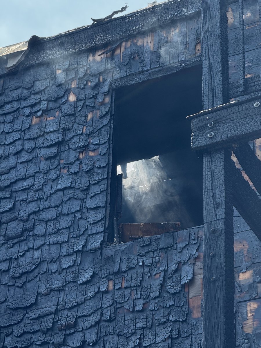BostonFire's tweet photo. Deputy Chief Hockings addressed the media. Detail companies are hitting hotspots as 1st on scene companies clear out &amp; rehab. Damages est. upward of 1.5 million on this vacant property. 2 firefighters were transported by BEMS for injuries. https://t.co/3F78SLeaww