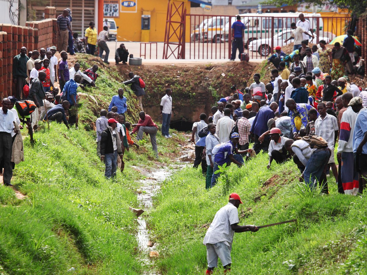 FactsOnRwanda's tweet photo. Rwanda's cleanliness wasn't achieved by Umuganda alone; it's been a long process.

It began with nationwide Umuganda campaigns focused on drainage channels, street walk ways, planting trees, and collecting plastic waste across the country, alongside the ban on plastic bags. Communities also built and renovated homes for vulnerable families, classrooms, and health posts.

As the environment improved, Umuganda shifted toward routine maintenance: cleaning public spaces, keeping neighborhoods bush-free, tree planting, maintaining roads, schools and health facilities, and preventing mosquito breeding.

Today, Umuganda is only one part of the system. It's reinforced by efficient waste collection, regular street cleaning, strong anti-littering enforcement, and a culture of public discipline. Umuganda laid the foundation and helped build the mindset, but Rwanda's cleanliness is the result of all these efforts working together. #FactsOnRwanda