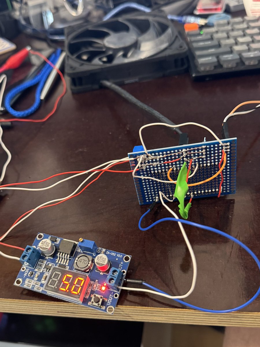 vanrohan776's tweet photo. Your office looks very interesting! I printed this labrax home lab for my local LLM server (128gb strix halo) and NAS. It was overheating during inference, so i got a temp sensor, esp32 and 2x Noctua fans and created my first "hardware" to auto cool down the homelab. Great feeling to create something like this, I'm thinking of my next hardware project now.