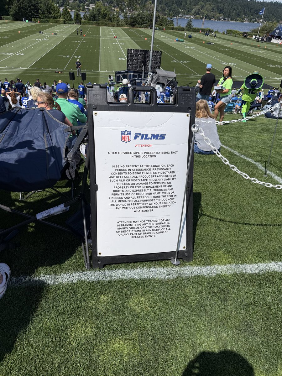 joelsmith's tweet photo. Today marks the first public day of Seahawks Training Camp. Several signs are posted around the facility that Hard Knocks will also be filming today. The defending Super Bowl Champions are ready to start the 2026 NFL season. https://t.co/FhqCQ1Mr7r