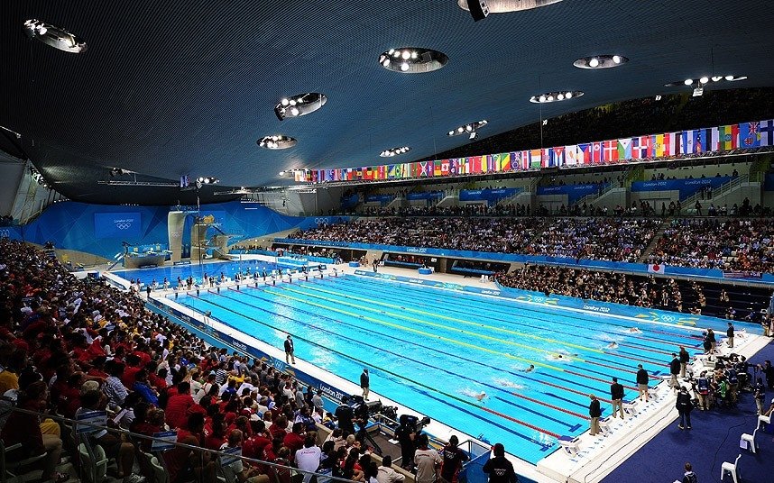 AlexF1BCL's tweet photo. The 2026 Glasgow Commonwealth Games swimming centre vs the 2012 London Olympics swimming centre...#London2012 #Olympics #Glasgow2026 #CommonwealthGames https://t.co/bVjDwzQyEt