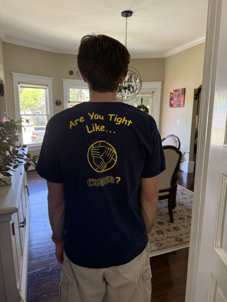 eamondotcom's tweet photo. didn’t pack properly for a weekend at my parents so I’m wearing one of the dozens of custom t shirts my dad had made after I tried a new catchphrase when I was 9 and he thought I’d get on Ellen https://t.co/SRCSXRN8Xq