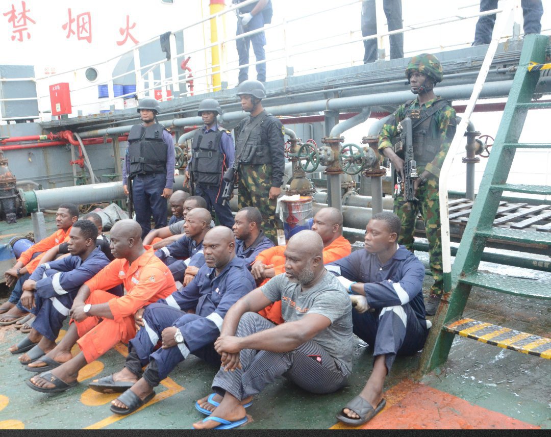 NgrImpact's tweet photo. PHOTONEWS: Navy arrests ship, crew members engaged in stealing crude oil in Niger Delta. https://t.co/HP9kGp7Ynn