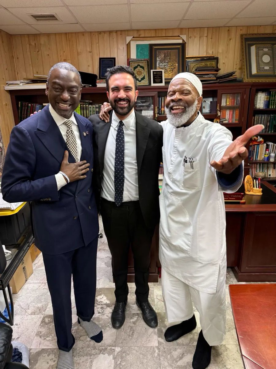 MikeMumbelz's tweet photo. 1. His administration tried to hold a secret meeting with Iran and the feds immediately shut it down.

2. He's endorsed by CAIR. The group was named as a co-conspirator in a terrorism funding lawsuit years ago. 5 members of the Texas branch were convicted.

3. He held a prayer event at Gracie Mansion where the people he invited gave the ISIS salute with grins on their faces.

4. He did a photo-op with one of the unindicted co-conspirators of the 9/11 bombers. Imam Siraj Wahhaj - (The bombing attack prior to 2001)

5. His wife literally celebrated terrorism and then deleted her account after being called out on it.

Stop gaslighting us. We know clearly what the fuck is going on and BS posts like this won't stop us from calling it out.