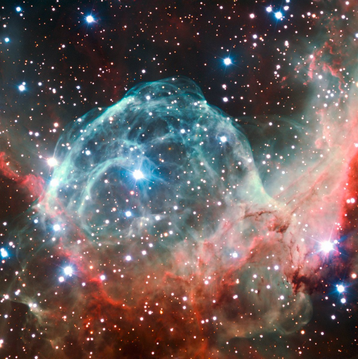 universal_sci's tweet photo. NGC 2359, or Thor's Helmet Nebula, showcases a striking cosmic bubble sculpted by the wind of a brilliant, massive star located at its heart as it moves through the surrounding molecular cloud.

(Credit: ESO/B. Bailleul) https://t.co/XQWS127QLi