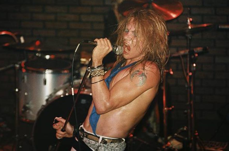 crockpics's tweet photo. Axl Rose screaming into the microphone at The Troubadour in West Hollywood back on June 6, 1985. This wasn't just any club gig—it was the very first performance of the classic Guns N' Roses lineup featuring Axl Rose, Slash, Izzy Stradlin, Duff McKagan, and Steven Adler. 

What is your favorite GNR song?👇️