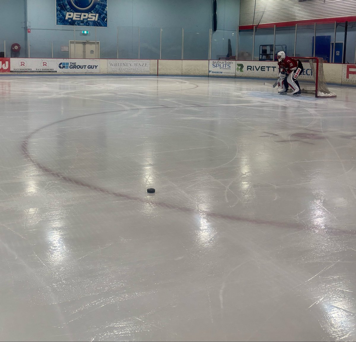 laurennkara's tweet photo. the only photo i have from hockey yesterday bc i thought it was funny that the puck was just sitting #there while all the players on the ice where arguing with the refs i love u aihl https://t.co/kKx4HnwuzI
