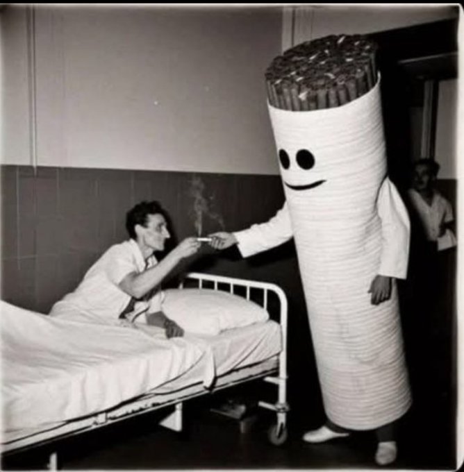 Rainmaker1973's tweet photo. Mr. Cig, visits a hospital patient with free samples of unfiltered smoking pleasure, 1948. https://t.co/6365NsWg7e