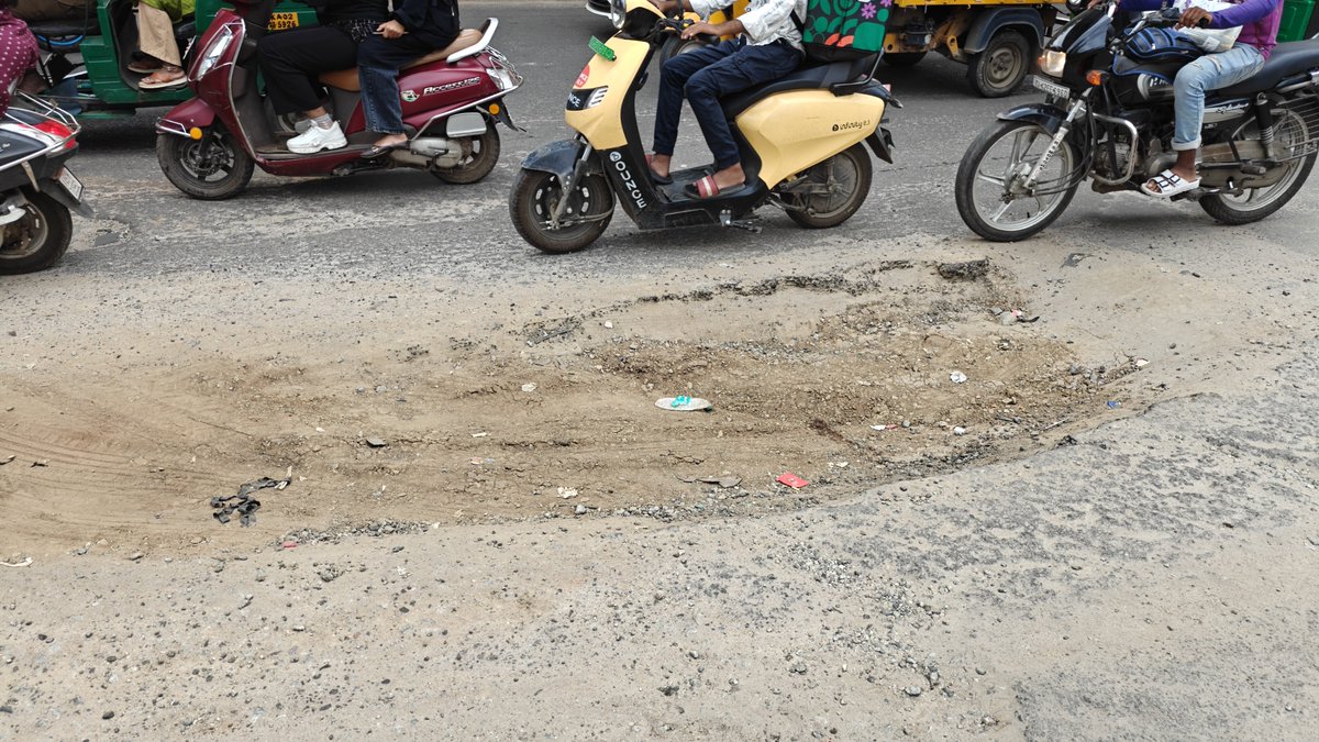 Raghav75389319's tweet photo. Reported multiple dangerous potholes between Meenakshi Mall &amp; Arekere Metro via GBA Sahaaya. This entire stretch needs resurfacing, not patchwork. Please act before accidents happen. @DKShivakumar @blrcitytraffic
@Jointcptraffic #Bengaluru https://t.co/j6UD9oDSCe
