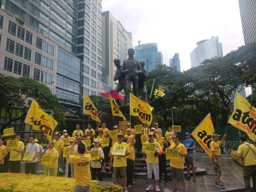 ABSCBNNews's tweet photo. Members of the August Twenty-One Movement (ATOM) and allied groups held a “ROAR! Against Corruption (Lakad para sa LABAN)” along Ayala Avenue in Makati City on Sunday during the city’s car-free Sunday program, Sunday, July 26, 2026. | via @eon_sanchez 

(Courtesy: ATOM) https://t.co/L62ehXWnIX