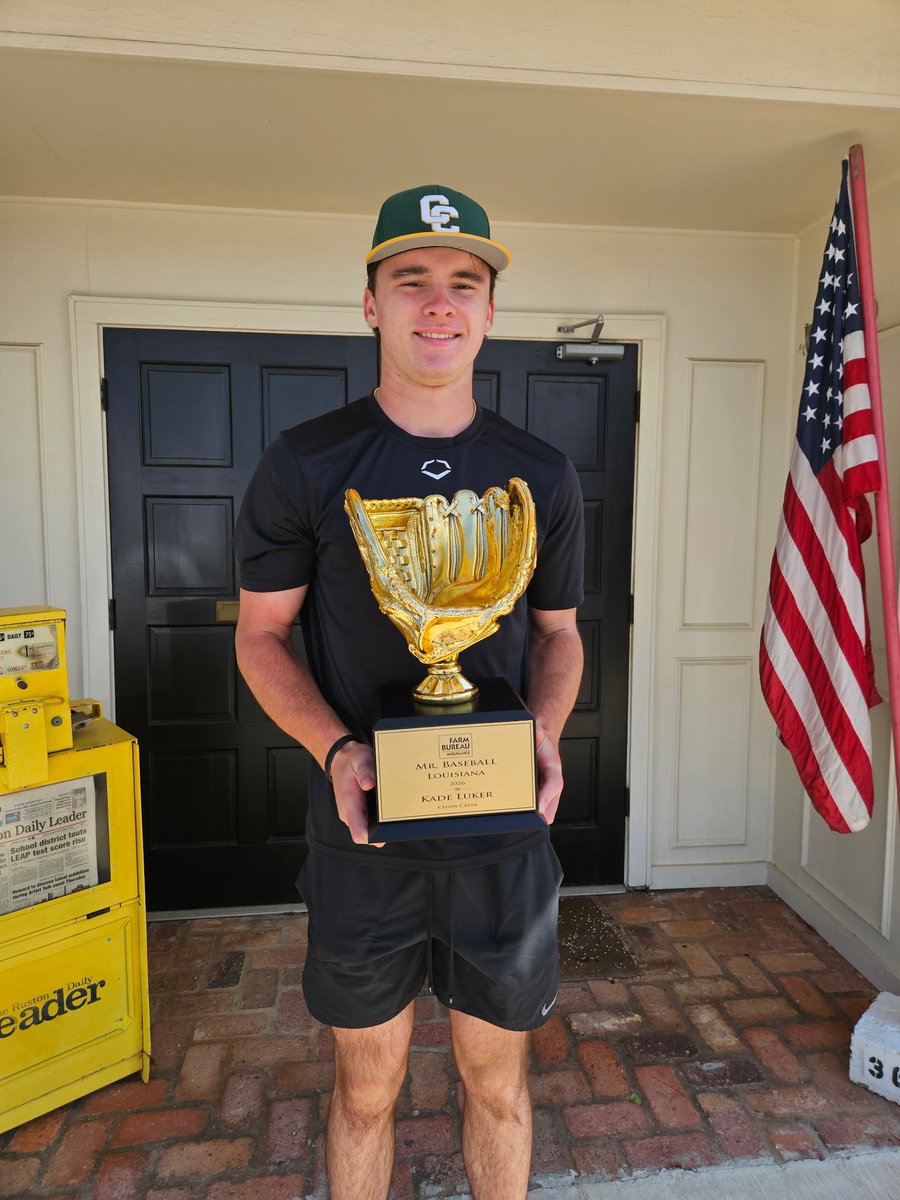 TheLSWA's tweet photo. 2026 LSWA Mr. Baseball Kade Luker of Cedar Creek holds up his trophy. — Photo by Matt Bellinson https://t.co/SJO12zTsUG