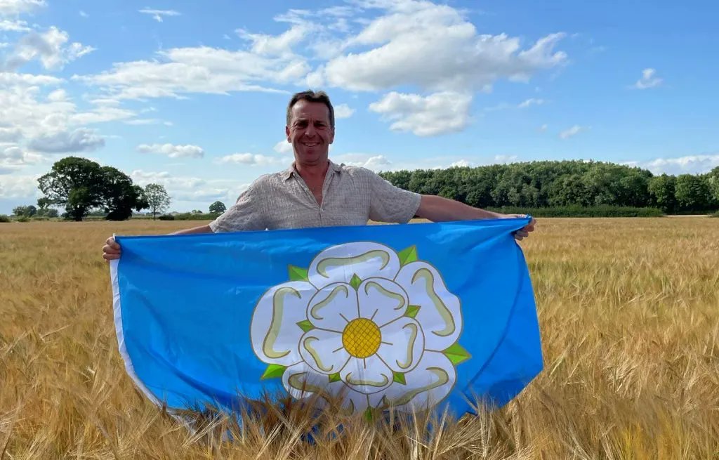 SamaHoole's tweet photo. Rob Sturdy signed a three-generation tenancy at Eden Farm, so that one of his children could take it on after him. Then the estate that owns the land agreed a deal to cover forty-two per cent of it in solar panels.

His grandfather Guy came to Eden Farm in 1954. His father John took over in 1971. Three generations at Old Malton, North Yorkshire, growing cereals and rearing dairy calves across 280 acres. A hundred and thirty of those acres are going under 90,000 panels and a battery storage system.

The Sturdys do not own an acre of it. They rent. The landlord signs the deal and collects the money. The tenant loses half the farm and gets nothing.

And it is worse than half. Take those fields away and what is left barely grows enough straw to bed and feed the cattle. You do not lose 42 per cent of a farm. You lose the farm, slowly, while it still looks like a farm from the road.

North Yorkshire Council refused the plan in October 2023. Five hundred people objected. It was the biggest fight over a planning application the area had ever seen. Then, just before the public inquiry opened, the government stepped in and took the final decision away from the inspector and handed it to a minister.

At that inquiry, the developer's barrister told the room the scheme would take just 0.16 hectares of the very best farmland.

Nought point one six. That is what a grading map can be made to say about a farm that feeds people.

The minister approved it in February 2025. His decision notice gave significant weight to the fact that the site sat next to a substation.

The family is finished because the cable was close.

They went to the High Court and spent heavily doing it. In September the judge found no arguable case. There is no compensation. Emma Sturdy has said they are not sure they can even stay in the house.

Rob Sturdy said one thing at the start that has stayed with me. He said he did not want this to become the last harvest.

He signed a contract for his children. A minister read a map.