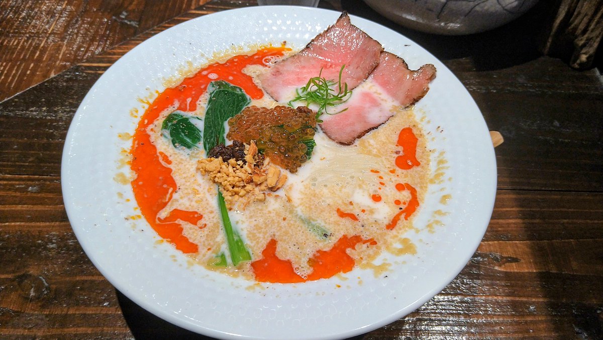 saima_tw's tweet photo. 2026冷やし三十四杯目@ MENSHO District

残念な気分で門仲を後に、次は課題店の此方で
いくらと和牛の冷たいアーモンド担々麺を啜る🌶️
冷え具合上々、程良い甘味と担々らしい刺激感が伴う
自分好みな美味さで、夜勤前の気つけに覿面な一杯でした👍 https://t.co/nv7Z9I5Pbs