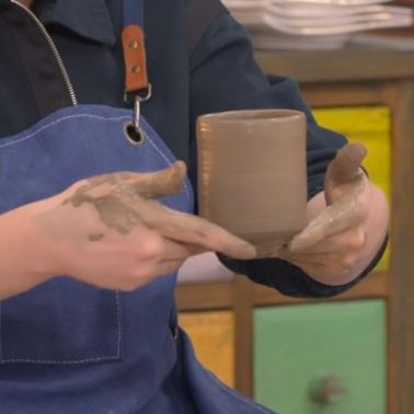 dailyjonghands's tweet photo. he looks so proud of himself and the cup he made https://t.co/t7NO9pegKO