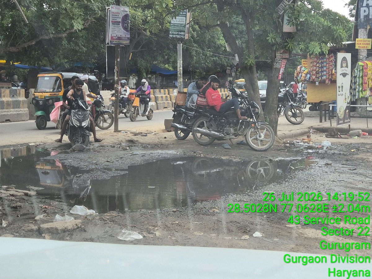 Outspoken_India's tweet photo. Narendra Modi Ji.. why is that  the citzens have to resort to dharnas for basic amenities. Gurugram is in shambles because of massive corruption by Babus &amp; Local Leaders.. Broken Roads, heaps of Garbage &amp; spilling sewage. Thank God that there's no Opposition here. #NitinGadkari https://t.co/BP0Ktkun07