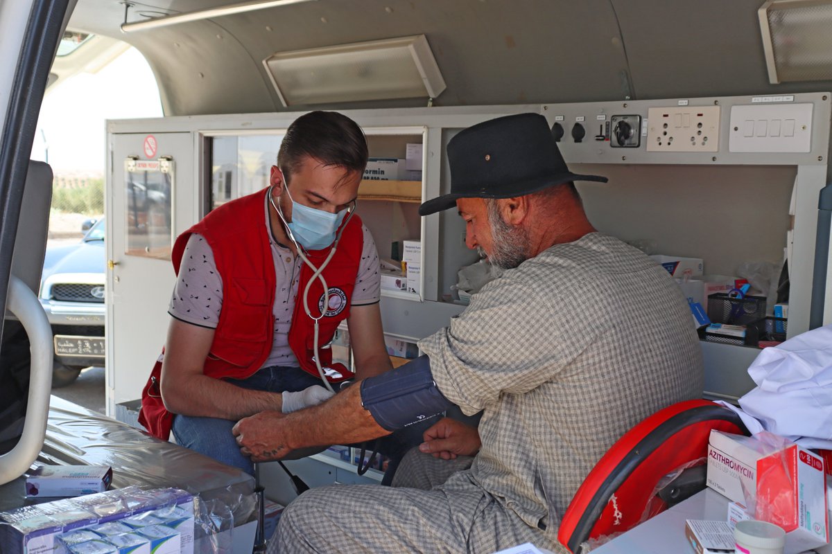 SYRedCrescent's tweet photo. #SARC mobile clinic continues serving families in Aq Burhan Camp in Akhtarin, rural #Aleppo, providing essential healthcare for children, women, and older people, with support from @IFRC_MENA . https://t.co/AtDj3dfvlH