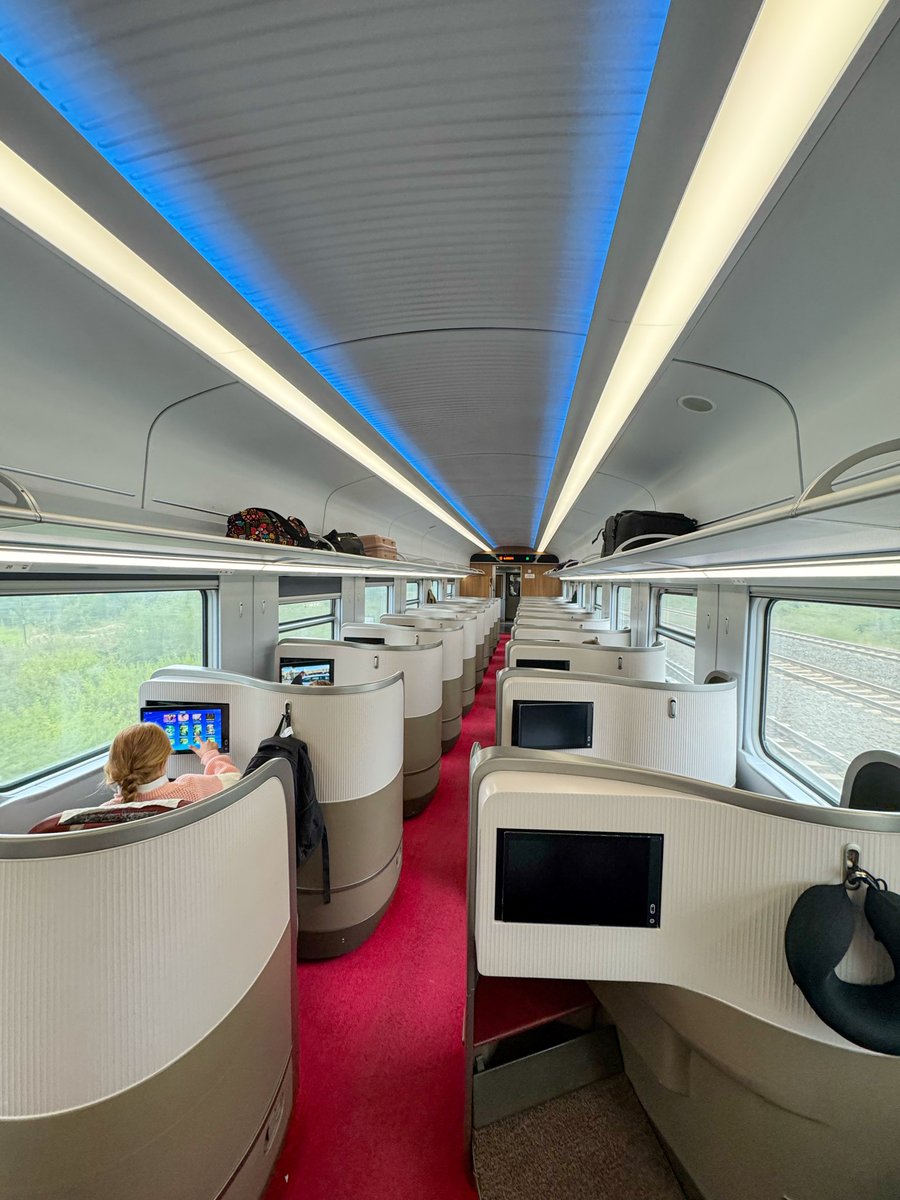 Ssenyonyiderick's tweet photo. Gliding from Nairobi to Mombasa on the
SGR🇰🇪

I couldn't help imagining it... a train from Kisoro to Kampala, Gulu to Kampala, one day, in this lifetime hopefully.

Anyway, let me tell you guys about the actual experience, Nairobi to Mombasa is nearly 500km, in about 5 hours. 

The train cuts straight through Tsavo, which means and I am not exaggerating, you can spot Elephants from your window seat.

A commute that doubles as a game drive.

The coaches are clean, the seats, I mean check the pics🙌, the whole thing runs on time.

They call it the Madaraka Express, I am going to call it a preview... of what East Africa could be.