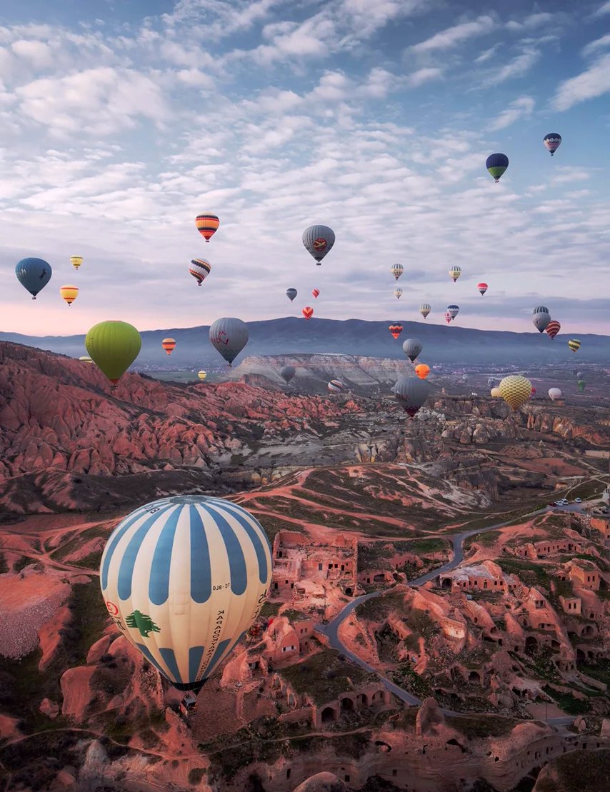 IiiJudith27576's tweet photo. Just had the most magical sunrise hot air balloon ride over Cappadocia—drifting above fairy chimneys with warm coffee in hand, no phone notifications, just pure, unplanned wonder. This is the kind of moment that sticks with you forever. https://t.co/kUnpK907HE