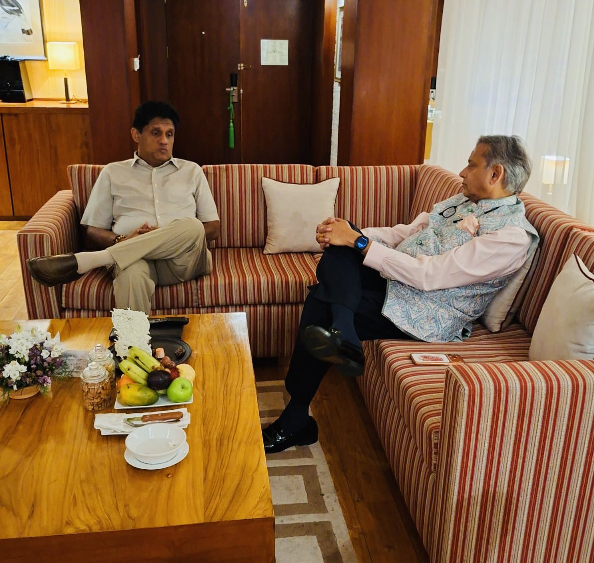 ShashiTharoor's tweet photo. The day extended late into the night with three engagements well after sunset, including a substantial conversation with Sri Lanka’s Leader of the Opposition, @sajithpremadasa, who graciously came to my hotel at a late hour to discuss recent developments in our countries. https://t.co/0c8sz9xNxm
