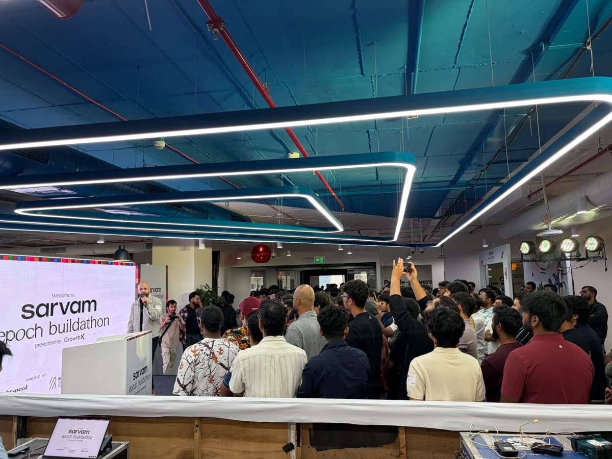 SarvamAI's tweet photo. The Epoch Buildathon wrapped up in Bengaluru today. Teams spent the day heads-down, building with the Sarvam stack.

Ten teams have made it through and will take the stage at Builder Day on 30 July to present what they built to a power-packed panel of judges.

Register for Epoch and watch them pitch and compete live: https://t.co/WD4z1oovEC