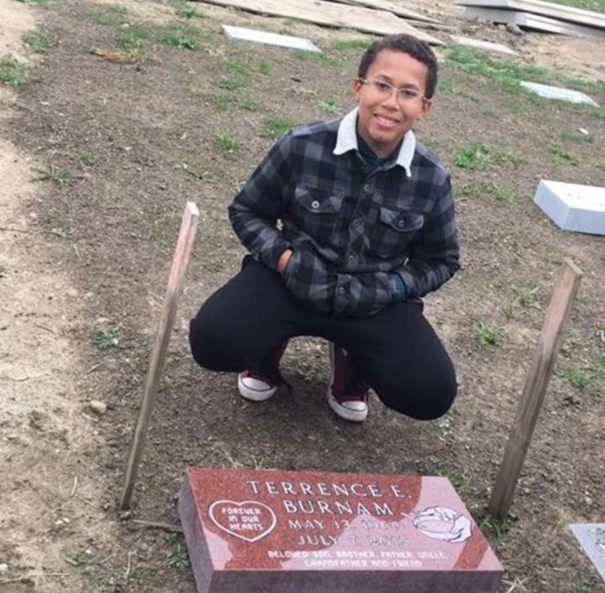 WolfofX's tweet photo. In 2015, 11 year old Brandon Bakke learned something that changed the way he saw his own story.

His biological father, Terrence E. Burnam, had died from an asthma attack before they ever had the chance to meet. Brandon also discovered that his father had been buried without a headstone because his family couldn't afford one.

He decided to change that himself.

All summer long, Brandon mowed lawns around his neighborhood, saving every dollar he could. His goal was simple. He wanted the man who gave him life to have a name that would never be forgotten.

When people heard what he was doing, Dakota Monument stepped forward and donated the headstone. Burr Oak Cemetery waived its fees, and in October 2016, Brandon stood beside his father's grave for the first time. It was also the first time he met many members of his biological family.

Later, Brandon started a project called Mowing and Blowing for a Purpose to help other families who couldn't afford headstones.

He never got the chance to meet his father. But through one summer of hard work, he made sure the world would always know where he rests.