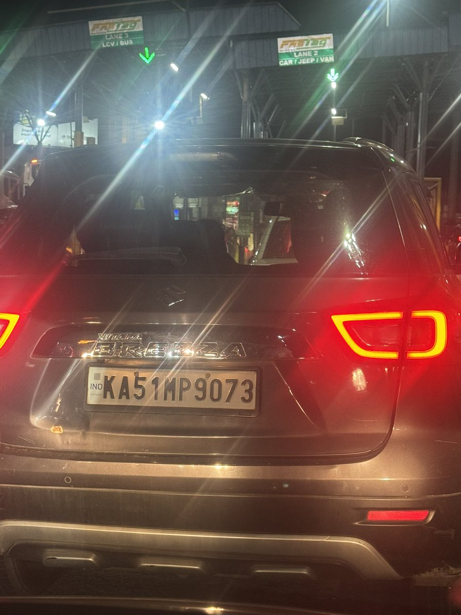 deepdhan's tweet photo. Lacking  basic lane discipline is one thing but this car cut the line so close at the toll  I wonder if civic exam along with driving license test is important before one gets to hold the steering wheel. #roadmanners https://t.co/kBYVoqdcDe