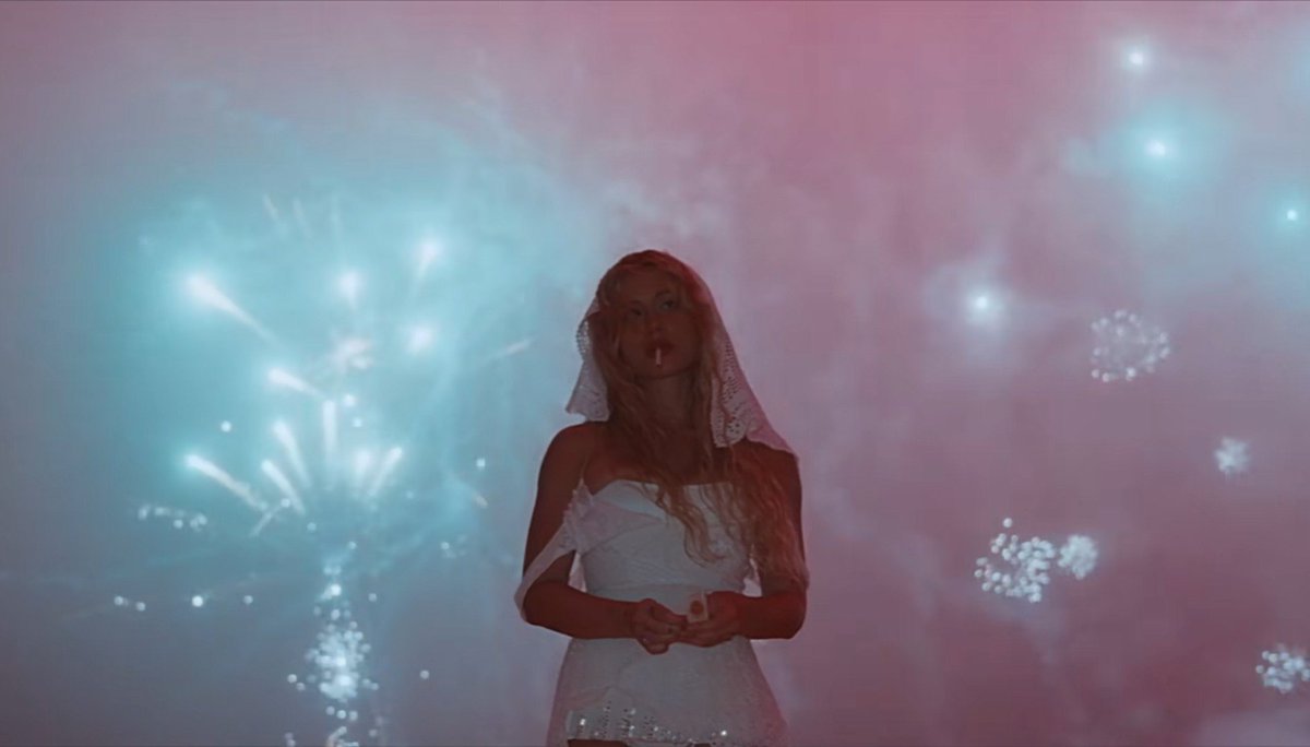 LUCIDNIGHTM4RE's tweet photo. imagine kicking off a new era with a mv you shot during the 4th of july fireworks so you could have the visuals you wanted for free, and a year later you're back here again, same visuals, inverted first single, but this time you're actually getting the flowers you deserve </3 https://t.co/RE47IateMx