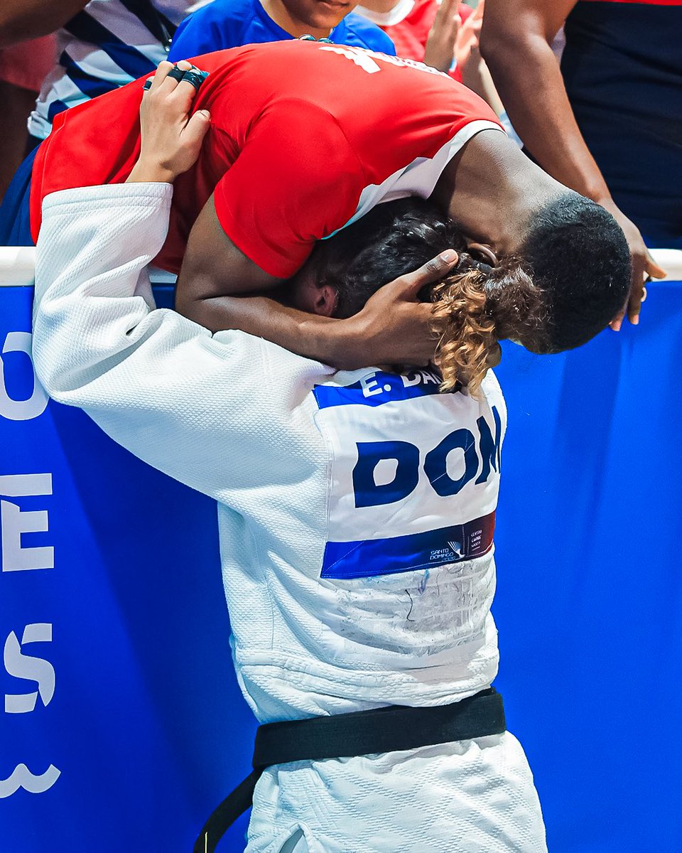 SDQ2026's tweet photo. El judo sigue haciendo historia y conquista el segundo oro en casa.🥋🥇

Esta vez de la mano de nuestra atleta Esmeralda Damiano. 😎🇩🇴🎉

Judo continues to make history, capturing our second gold on home soil. 🥋🥇

This time, led by our athlete Esmeralda Damiano! 😎🇩🇴🎉

#SantoDomingo2026 #JuesgosDelCentenario #Judo