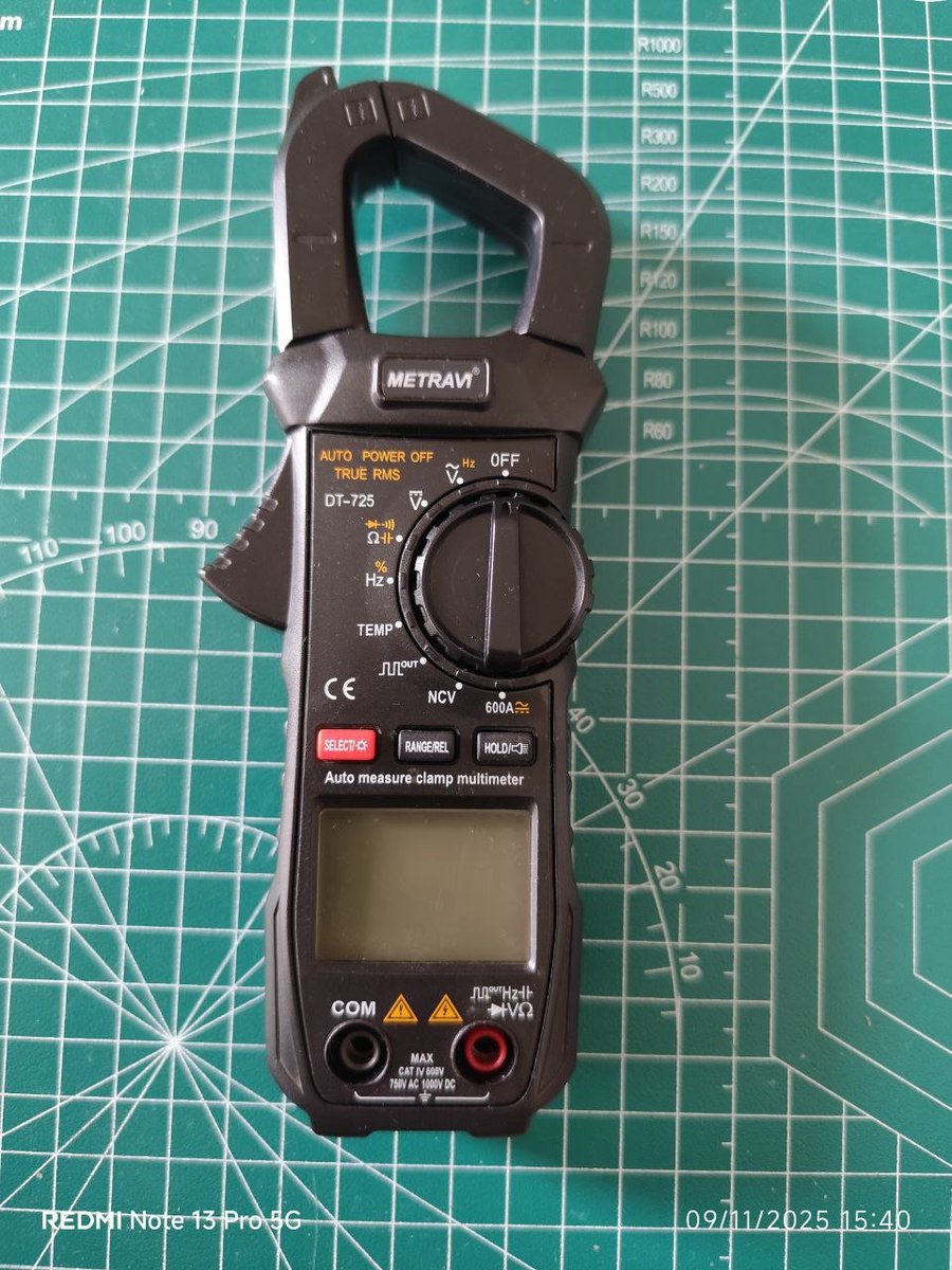 atharvasp8's tweet photo. So in today's episode of teardown SUNDAY, we have a Metravi DT-725 Clamp meter as a test subject. 
I get astonished, that an equipment, which is pocket sized, has insane capabilities. We are talking about Voltage measurement, all types of function tests like diode, resistance, continuity, capacitance, temperature, and even FREQUENCY GEN output. Besides all that, this thing can measure upwards of 600Amps AC/DC, via the clamp part of the meter. 
It can do it non invasively. Meaning:
1. You don't need to cut the wire 
2. No need to put the meter in series and wire anything physically. 

It does so by something called hall effect sensors. 

Learn more about hall effect here:
https://t.co/zVhMEPSENN

When an amount of electric current flows through an wire, it creates magnetic fields around the wire. These jaws, have two halfs of iron core inside them. This principle is coming from mutual electromagnetic induction. 
Meaning, the emf fields in wire create similar fields inside the iron cores. 
And, the linear hall effect sensor sits in between the jaw ends, picking up any magnetic fields created in the core via an air gap. 
 These sensors are incredibly sensitive, meaning they can check very small amounts of magnetic fields ranging from ±400 Gauss to ±1000 Gauss.

Also typically, these cores have some residual magnetism, due to obvious earth magnetic field deflections and changes. That's why these clamp meters have a RELATIVE or ZERO function. That function simply clears out any added error, and starts measurement from zero value. 

This ensures you get a perfect accurate reading. 

Even after that, these meters are not that much sensitive to very very small currents, like below 500milliamps or so. But it becomes obvious to use an normal multimeter with current sensor capacity at that current range. 

With that being said, we'll come to the description of parts:

1. Clamp Jaws 
2. Main PCB with backlight board.
3. LCD display with elastomeric connector (pink) 
4. Selector Knob switch 
5. Main body housing (back) 
6. Buzzer 
7. Main body housing (front)

All these parts are self explaining, so I am leaving that part. Rest, feel free to ask any doubts down below!

See you tomorrow on Oscilloscopes 101 Series, COMRADES!