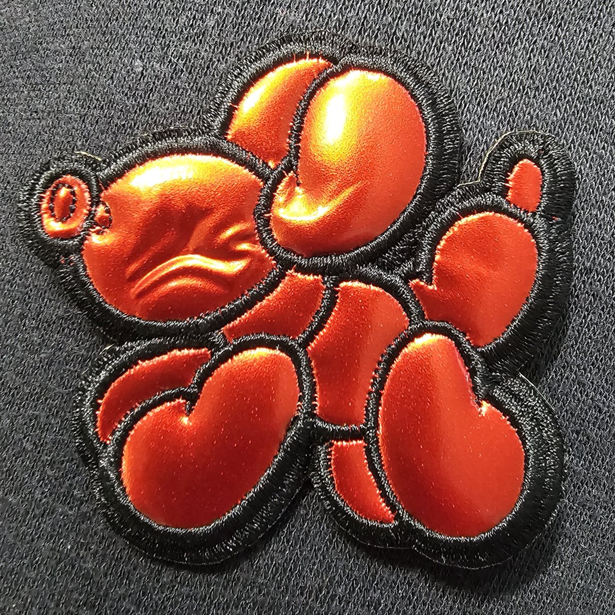 DeadBombArt's tweet photo. I had a really cool idea/experiment with embroidered patches, trying to make parts of it rubbery and inflated.

Unfortunately, due to the nature of iron-on patches needing to be heated many times -- it kept deflating and getting a wrinkly texture.

Must keep trying~ 🎈 https://t.co/MxFk0jxBiA