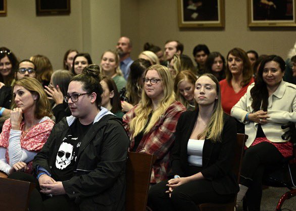 lanadiedforme's tweet photo. imagine walking into a courthouse surrounded by people who HATE you to be forced to recount your husband raping &amp; beating you in front of a bunch of strangers, the jury, and the entire world while someone in the gallery is wearing a shirt with his face on it. impartial my ass. https://t.co/DE1ljoE9xd