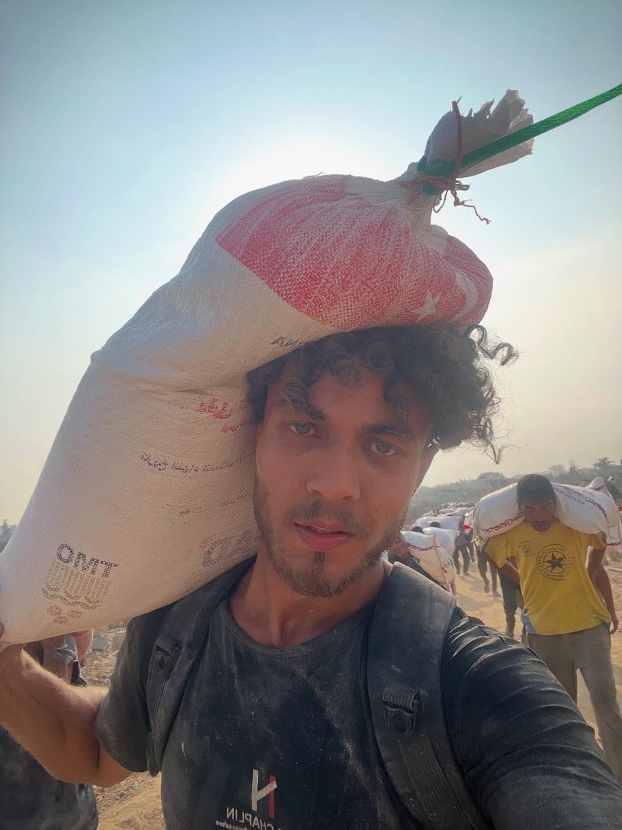 M_shebrawy3's tweet photo. 26/7/2025

I took these photos exactly one year ago, on July 26. That day, I risked my life alongside thousands of Palestinians just to get a bag of flour to feed myself and my family. I waited for 15 hours surrounded by death before I finally got one bag. Then I carried it on my shoulder and walked 7 km..

I will never forget what I went through during the Israeli genocide in Gaza, and I will never forgive those who left us to face this fate alone