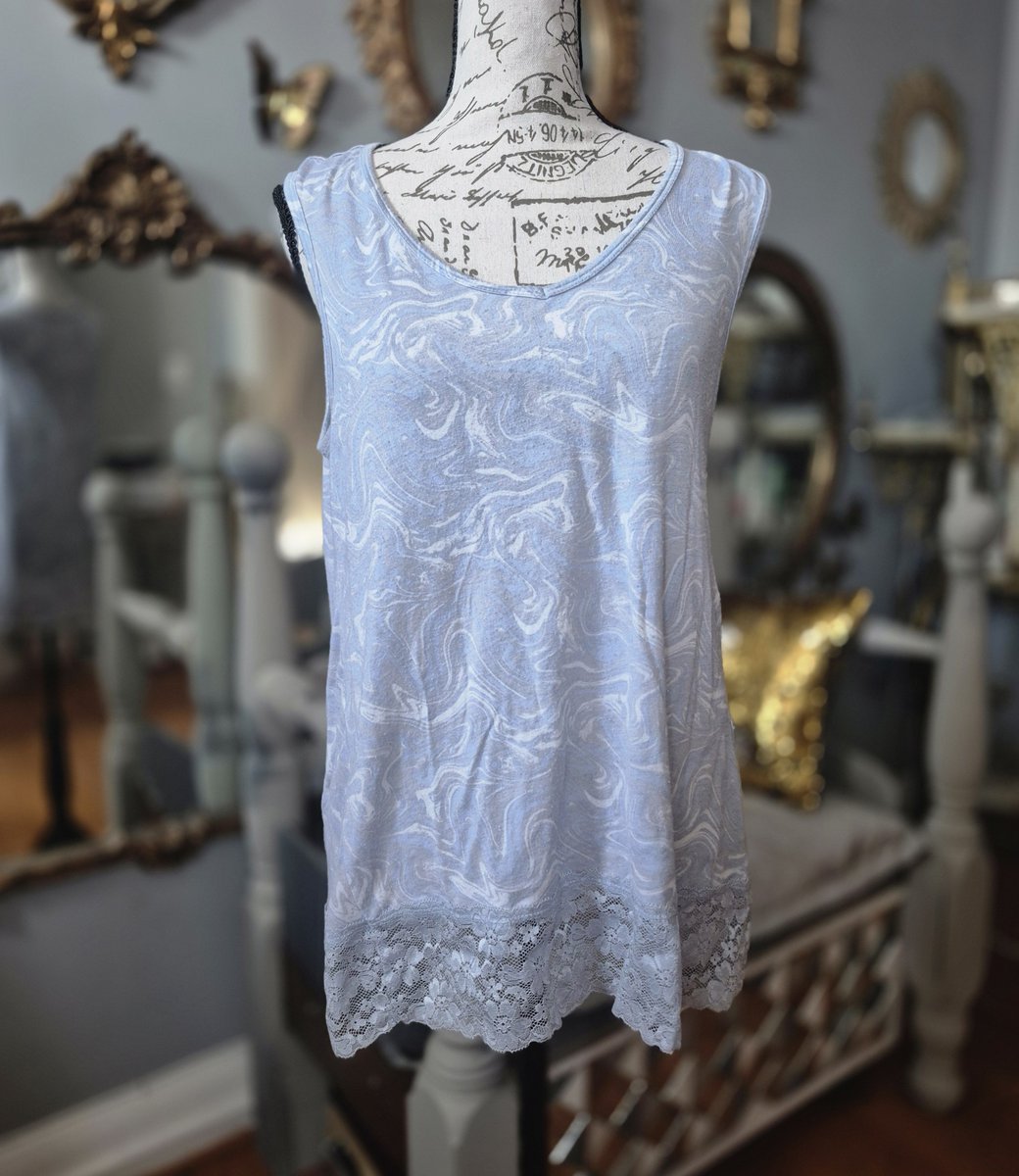 MolotovFlicker's tweet photo. Last year, I bought two blouses in not great condition at two different thrift stores and paired them together to create a layered effect. The combination still looks like...a blouse in not great condition. I habitually find lacey things and like them enough to see possibilities. https://t.co/rd7NeyRu0i