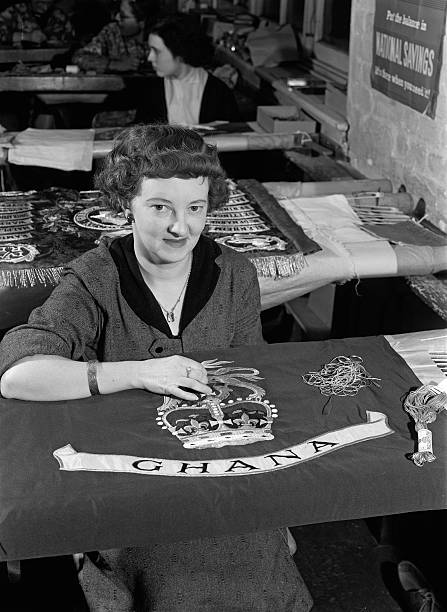 KZankeli's tweet photo. ivy eke hand-embroidering a ghana banner at hobson & sons in lexington street, london, on february 28th, 1957.

the banner was intended for use during ghana’s independence celebrations, but made-in-ghana* had other plans.

🎥: ron stone