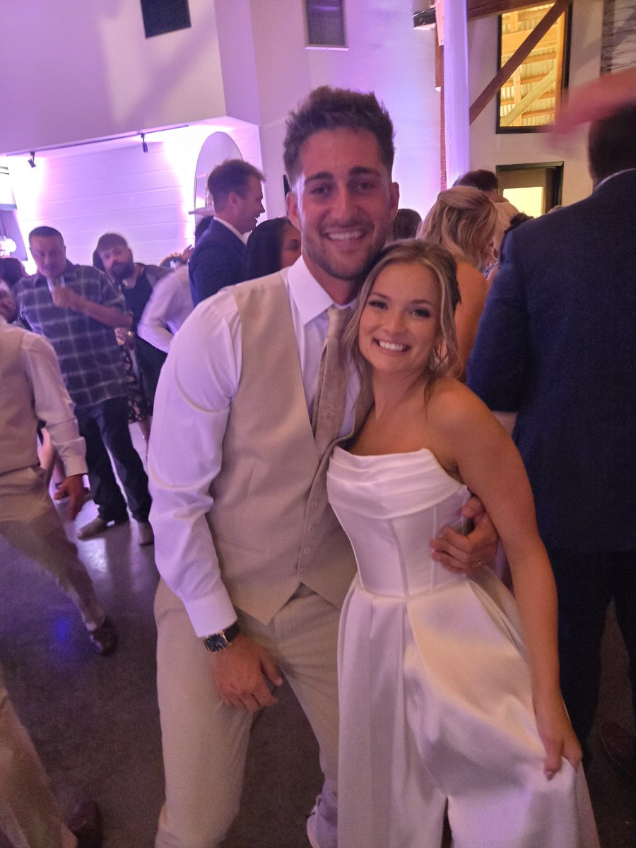 DGS_Football's tweet photo. Congratulations to Coach Pawlak and his new wife, Becca! It was a wonderful celebration, and we were honored to be a part of their special day. Becca, welcome to the HIT HARD family! #justmarried #HitHard https://t.co/B8BRdpMRX6