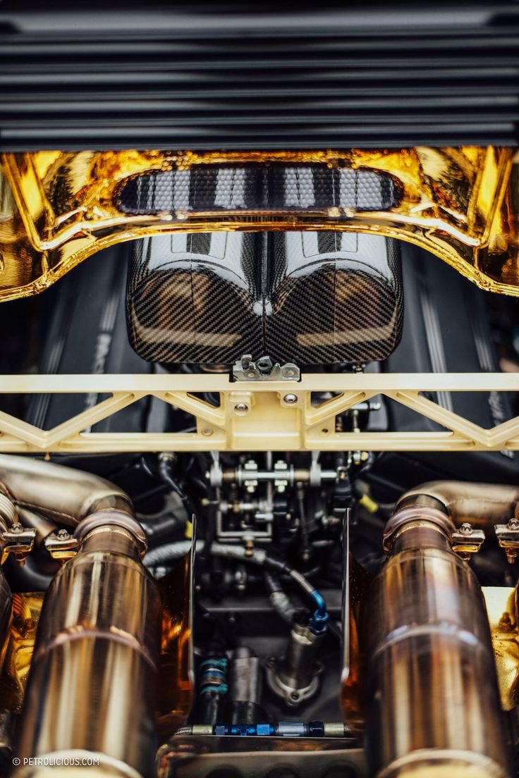 Timeless_Vis's tweet photo. To protect the engine bay from extreme heat, McLaren engineers lined the entire exhaust compartment with a layer of pure 24-karat gold foil for optimal thermal insulation. https://t.co/uXe0BD3nsQ
