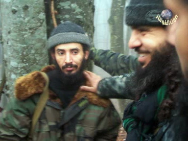 HPomegranates's tweet photo. @jizyaenjoyer @theluck1516 Abu Jaffar al-Yemeni, an example of steadfastness and leadership. A still from the same scene from Russian Hell part#4. There is video with a date of this, it was Jan/Feb 2000. Abu Waleed, Abu Hafs, Yaqub the other Ahmedov amirs can be seen. https://t.co/JUE5qn7eno