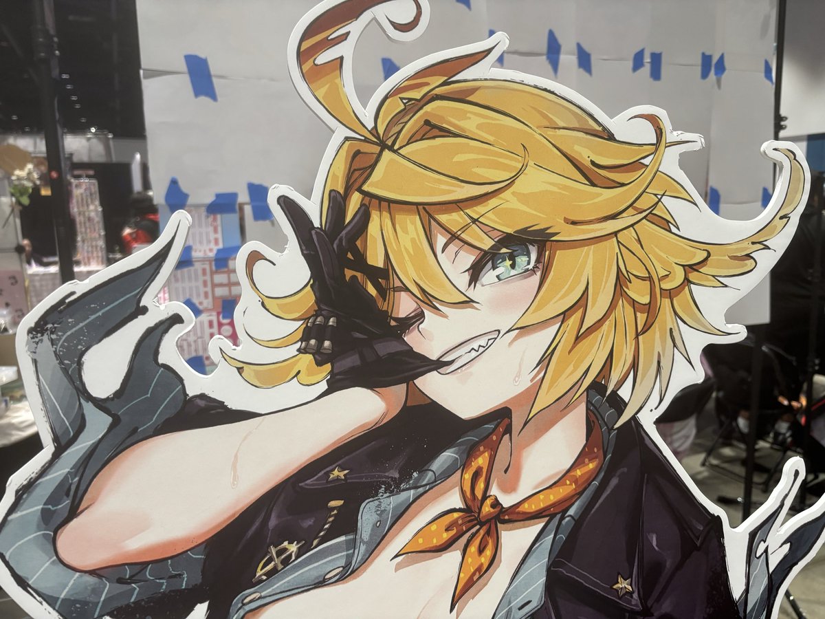XekraTheLunatic's tweet photo. People looking at the Dokibird standee by @/RobotCatArt which I won while they’re buying merch from my friend’s table. https://t.co/Gcy2XtrqZA