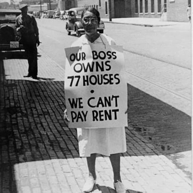 awkwardgoogle's tweet photo. A woman protesting rent inequality, 1930s. https://t.co/WITgqTh9NI