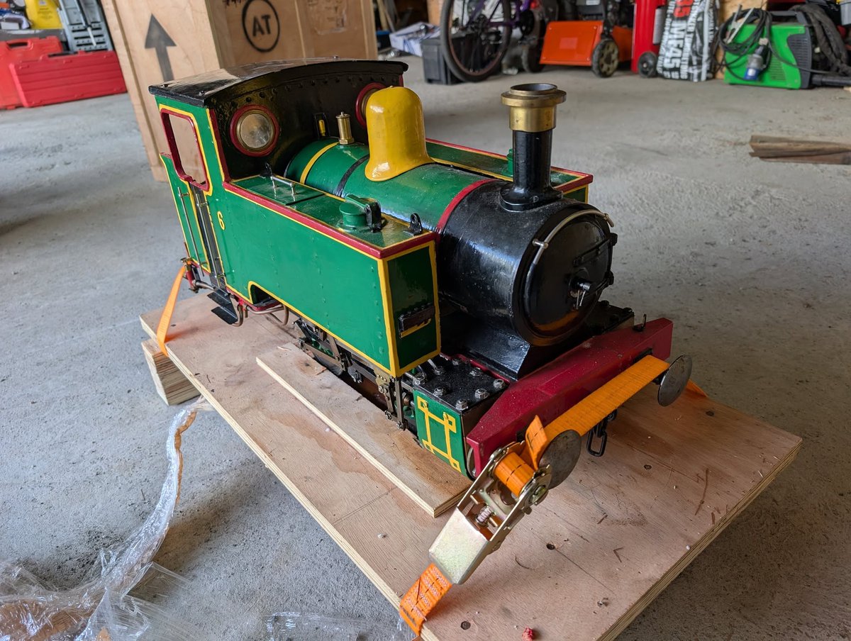 LittleRedToyo's tweet photo. Totally forgot to tell you guys I bought a 5 inch gauge steam engine. I have tested her and I have a lot of work to do before she will be ready to drive. I will repaint her too, she looks like a drunk person painted her... My kid has navned her "Ildflua" (Firefly). https://t.co/tEj0QTpqOW