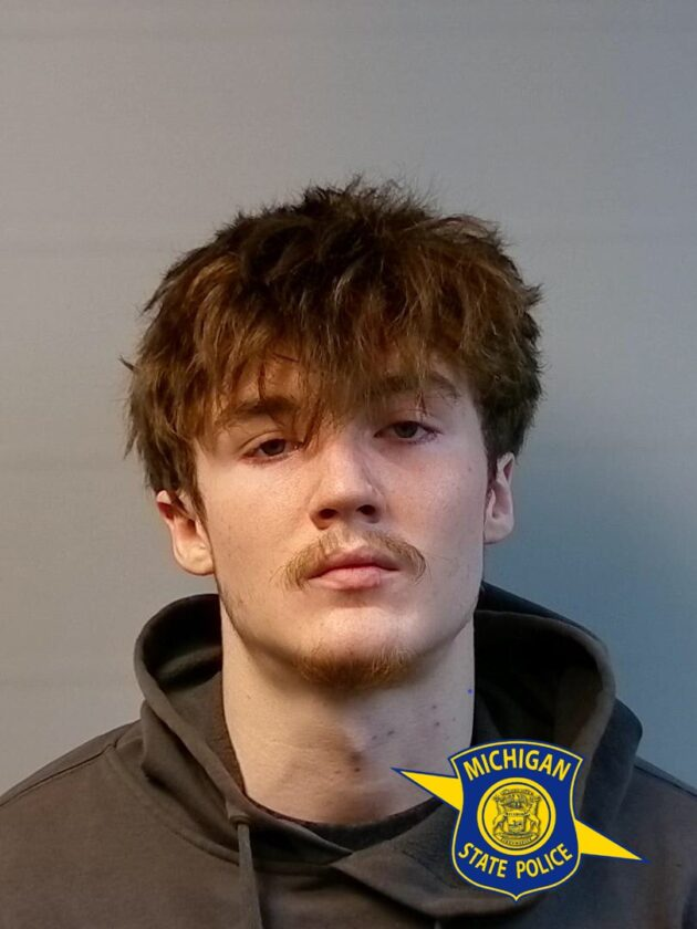 lettermichigan's tweet photo. A teenager was arrested after spray-painting this anti-Trump mural during a protest. 

He's now being held without release and prosecutors are reportedly seeking a sentence of up to 30 years. 

Agree with the message or not, does graffiti really deserve a punishment this severe? https://t.co/XLHyqGDPto