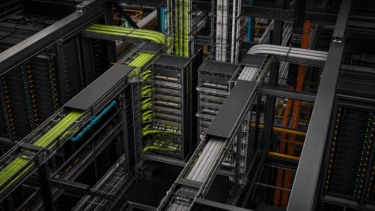 Romolooo's tweet photo. AI Data Centers won't be planar forever. 
Here's my concept, helped by GPT Sol.

A floorless 3D compute-lattice: extractable liquid-cooled racks, shorter interconnects, and infrastructure designed as one volumetric machine.

Interactive model:
https://t.co/pnWDv5cBcE https://t.co/bDAi5QCzTo