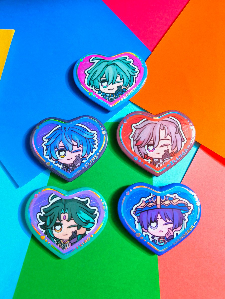 tsokolatesea's tweet photo. Here are Foil Heart Button Pins of Lohen, Flins, Illuga, Xiao &amp; Wanderer that will be available at #HoYoFESTPH2026!  (If you look closely, you'll notice that the heart shape is a bit different than the usual heart buttons here!)

Drop by at table#25!

#hoyofestph #HoYoFEST2026 https://t.co/s1CwAbxZyx