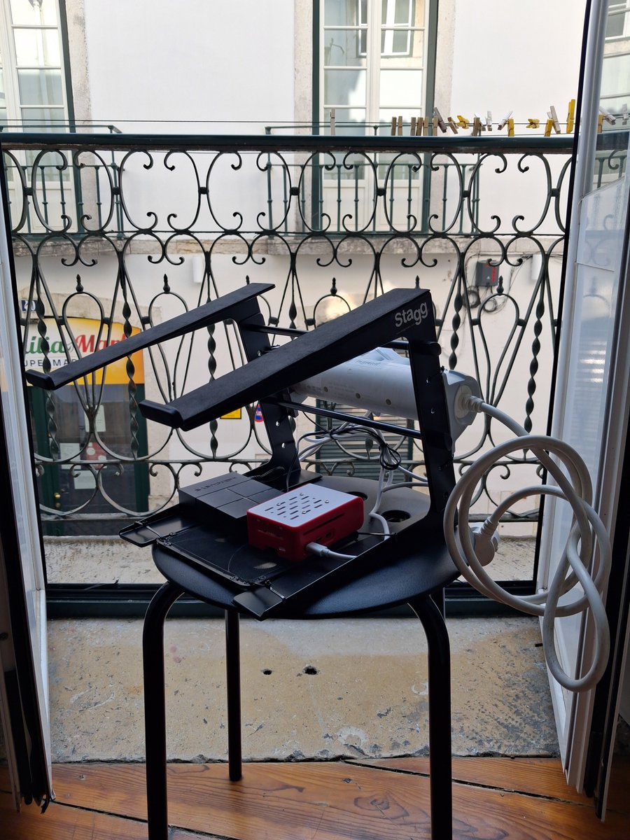 Superdido13's tweet photo. Pi + switch mounted, power secured, cables running — improvised with a DJ stand. Still waiting on the cable-making kit, a new router, and eventually a mini PC for NAS storage before this is fully wired up. 

#SuperDiDzero #PCBuildPT #Portugal #HomeLab #RaspberryPi https://t.co/rOaDKM8Dqe