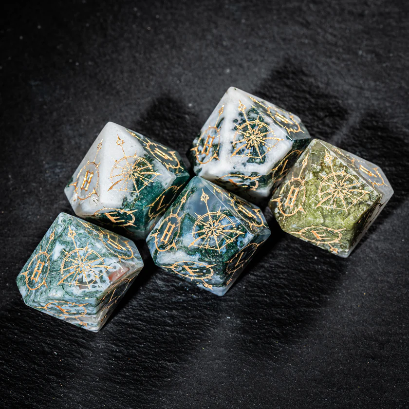 urwizards's tweet photo. Your party finds these in an abandoned elven shrine.
Moss Agate dice with golden bow engravings, made for rangers, druids, and anyone who trusts the forest more than the king.

#dnddice #ttrpgdice #gemstonedice #dicegoblin #dungeonsanddragons #ranger #druid #dicecollection https://t.co/aFBpanKdTB