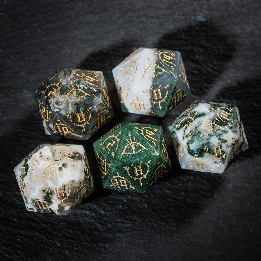 urwizards's tweet photo. Your party finds these in an abandoned elven shrine.
Moss Agate dice with golden bow engravings, made for rangers, druids, and anyone who trusts the forest more than the king.

#dnddice #ttrpgdice #gemstonedice #dicegoblin #dungeonsanddragons #ranger #druid #dicecollection https://t.co/aFBpanKdTB