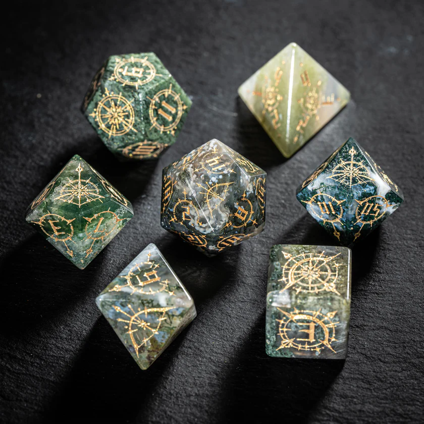 urwizards's tweet photo. Your party finds these in an abandoned elven shrine.
Moss Agate dice with golden bow engravings, made for rangers, druids, and anyone who trusts the forest more than the king.

#dnddice #ttrpgdice #gemstonedice #dicegoblin #dungeonsanddragons #ranger #druid #dicecollection https://t.co/aFBpanKdTB